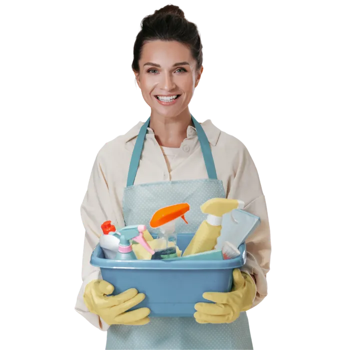 A smiling Duda's cleaning professional holding a caddy of supplies