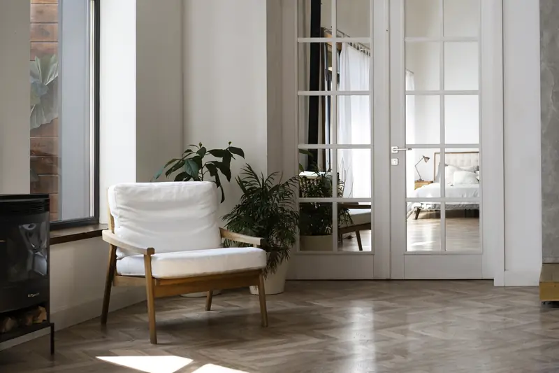 Sunlit living room with clean wood floors